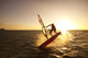 Windsurfer Sailing Off The Coast Of South Maui At Sunset Wall Mural
