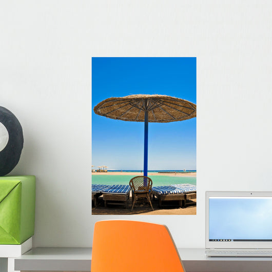 Straw umbrellas on the beach of Egypt Wall Mural