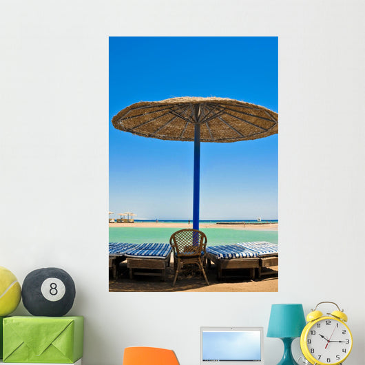 Straw umbrellas on the beach of Egypt Wall Mural