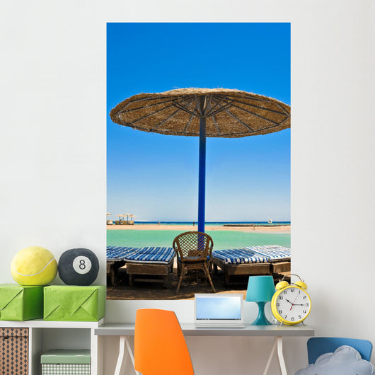 Straw umbrellas on the beach of Egypt Wall Mural