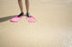 Hawaii, Woman Wearing Pink Snorkel Flippers On Sandy Beach Wall Mural