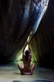 Woman Doing Yoga In Sea Cave Wall Mural