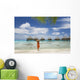 Woman On Beach Near Luxury Resort Wall Mural