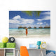 Woman On Beach Near Luxury Resort Wall Mural