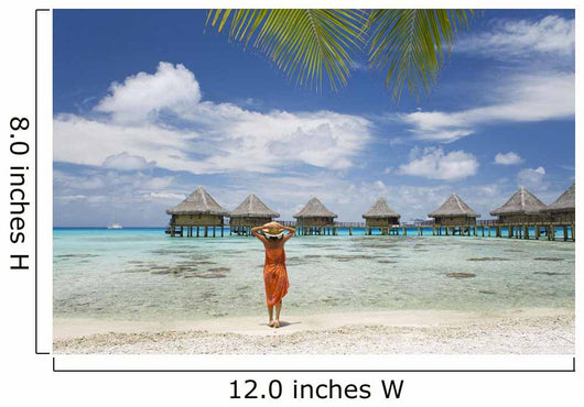 Woman On Beach Near Luxury Resort Wall Mural