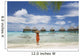 Woman On Beach Near Luxury Resort Wall Mural