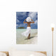 Woman In White Standing At Ocean's Edge Wall Mural
