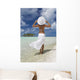 Woman In White Standing At Ocean's Edge Wall Mural