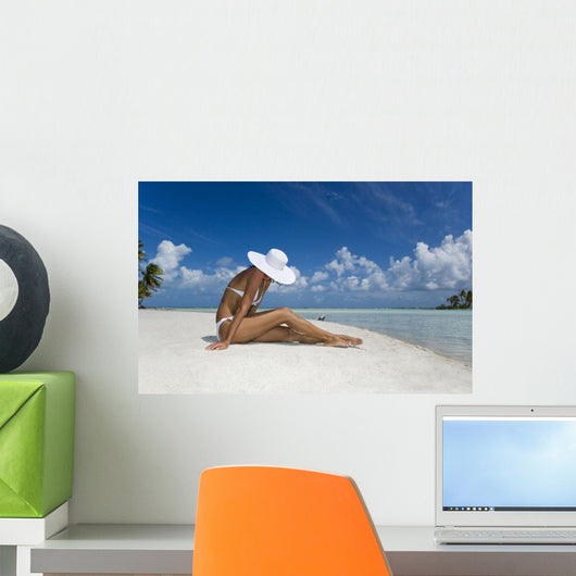 Woman Sitting On White Sand Beach Wall Mural