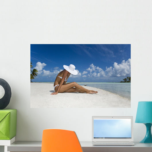 Woman Sitting On White Sand Beach Wall Mural