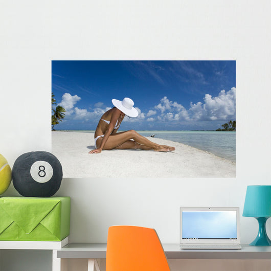 Woman Sitting On White Sand Beach Wall Mural