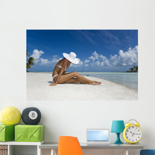 Woman Sitting On White Sand Beach Wall Mural