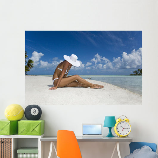 Woman Sitting On White Sand Beach Wall Mural