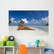 Woman Sitting On White Sand Beach Wall Mural