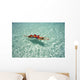 Woman Floating In Tropical Ocean Water Wall Mural