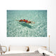 Woman Floating In Tropical Ocean Water Wall Mural