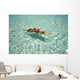 Woman Floating In Tropical Ocean Water Wall Mural
