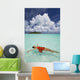 French Polynesia, Woman Floating In Ocean Water Wall Mural