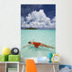 French Polynesia, Woman Floating In Ocean Water Wall Mural