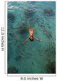 School Of Fish Encircling Woman Floating In Tropical Ocean Water Wall Mural