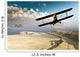 Two vintage WWI double wing biplanes flying over canyon Wall Mural