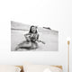 Young Girl Smiling And Playing Ukulele On The Beach In A Hula Skirt Wall Mural