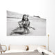 Young Girl Smiling And Playing Ukulele On The Beach In A Hula Skirt Wall Mural