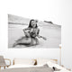 Young Girl Smiling And Playing Ukulele On The Beach In A Hula Skirt Wall Mural