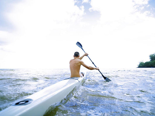 Hawaii, Kauai, Anini Beach, Active Male Paddling In A One Man Canoe Wall Mural