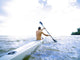 Hawaii, Kauai, Anini Beach, Active Male Paddling In A One Man Canoe Wall Mural