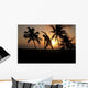 Silhouette Of Man Stretching Near The Beach As The Golden Sunsets Wall Mural