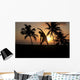 Silhouette Of Man Stretching Near The Beach As The Golden Sunsets Wall Mural