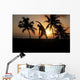 Silhouette Of Man Stretching Near The Beach As The Golden Sunsets Wall Mural