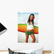 Beautiful Local Girl Smiling And Holding A Colorful Surfboard Wall Mural