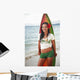 Beautiful Local Girl Smiling And Holding A Colorful Surfboard Wall Mural