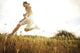 Hawaii, Oahu, Atheltic Male Jogging On An Outdoor Field Walkway Path Wall Mural