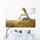 Hawaii, Oahu, Atheltic Male Jogging On An Outdoor Field Walkway Path Wall Mural