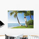 Ready To Swing His Golf Club At A Beach Front Golf Course Wall Mural