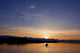 Sunset, Kayaking Through Beautiful Mountain Ranges Wall Mural
