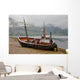 A Fishing Boat Abandoned On The Shore Wall Mural