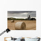 A Cement Production Plant With Hay Bales In A Field In The Foreground Wall Mural
