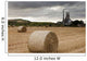 A Cement Production Plant With Hay Bales In A Field In The Foreground Wall Mural