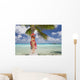Woman Relaxing On Palm Tree Trunk Overhanging Tropical Ocean Wall Mural