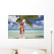 Woman Relaxing On Palm Tree Trunk Overhanging Tropical Ocean Wall Mural