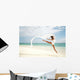 Beautiful Female Ballet Dancer Leaping Into Air Wall Mural