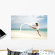 Beautiful Female Ballet Dancer Leaping Into Air Wall Mural