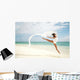 Beautiful Female Ballet Dancer Leaping Into Air Wall Mural