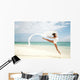 Beautiful Female Ballet Dancer Leaping Into Air Wall Mural