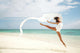 Beautiful Female Ballet Dancer Leaping Into Air Wall Mural