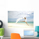 Beautiful Female Ballet Dancer Leaping Into Air Wall Mural